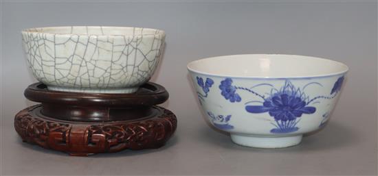 A Chinese crackle glaze bowl, early 20th century blue and white bowl and a wood stand largest diameter 17cm